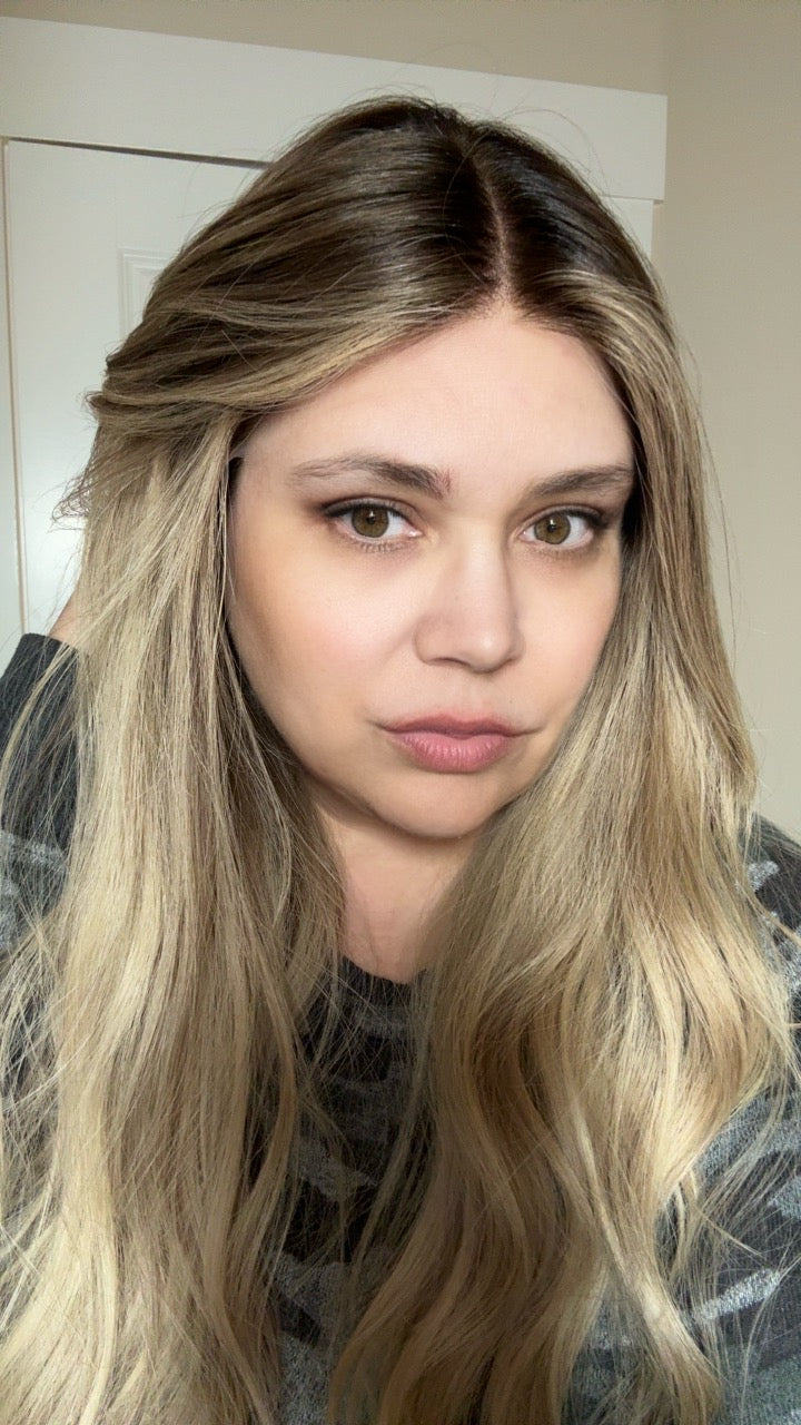 beautifully parted blonde highlighted wig