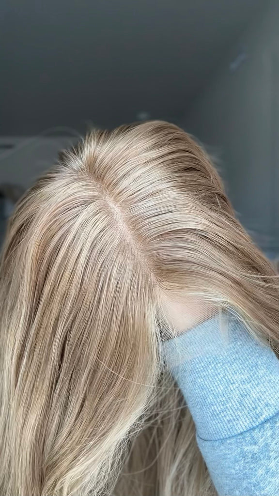 Natural hair part on this blonde highlighted natural human hair wig