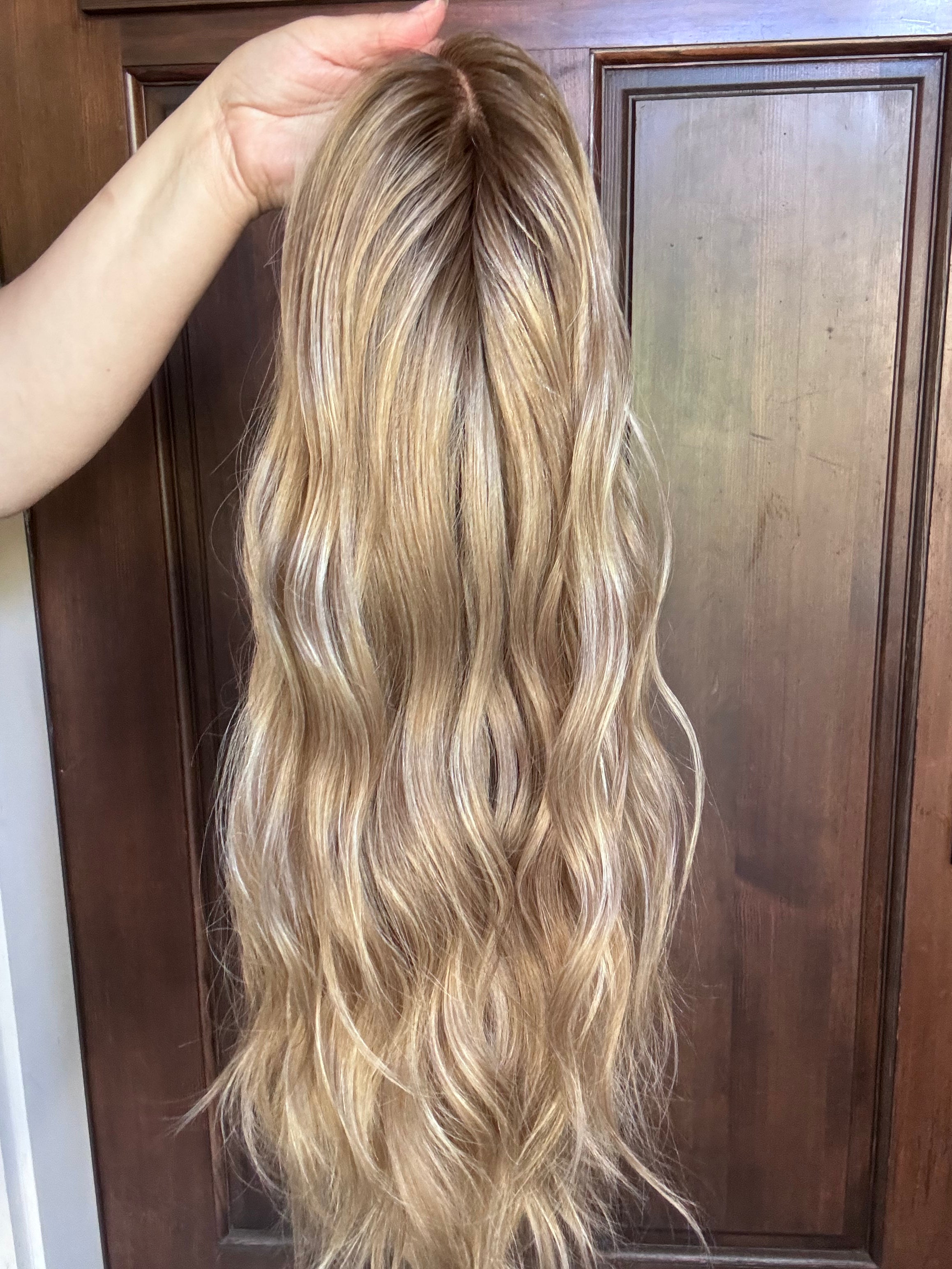 Look at the beautiful waves in this blonde natural looking wig. 